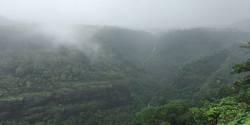 Scenic view of Matheran hill station with lush greenery and cloudy sky