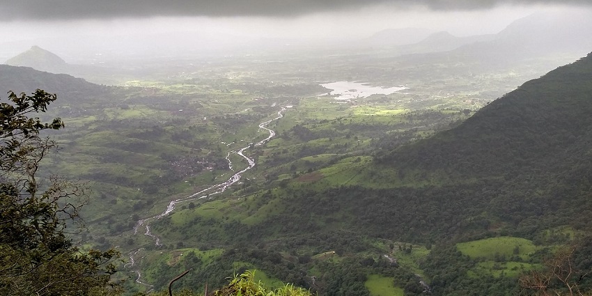 Scenic view from a hill in Matheran, showcasing lush green valleys