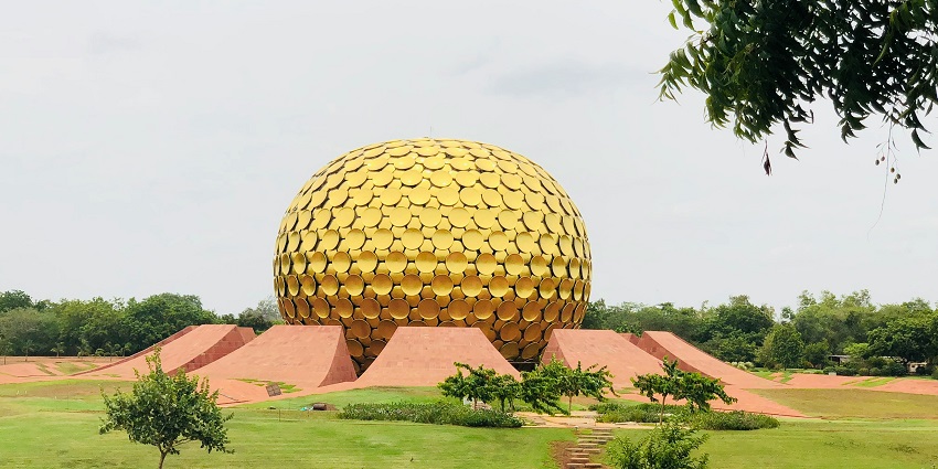 A glimpse of the iconic Matrimandir, one of the best places to visit in Auroville.