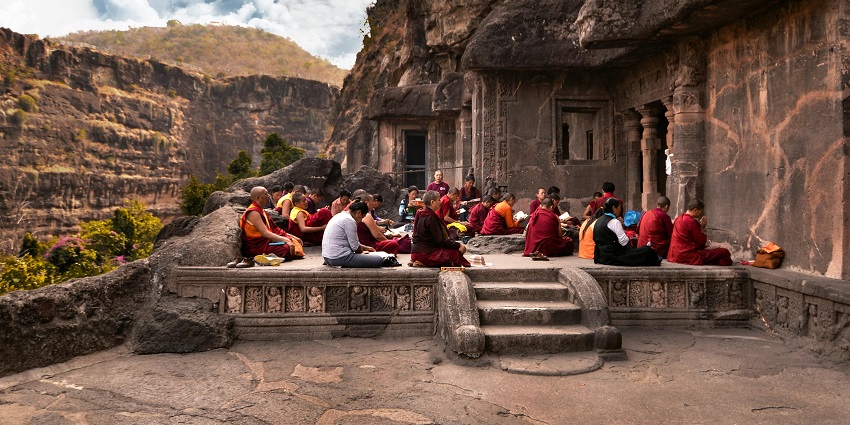 A picture of people meditating in a serene environment