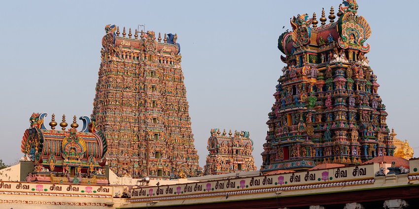 The towering West Tower of Meenakshi Amman Temple in Madurai is adorned with carvings.