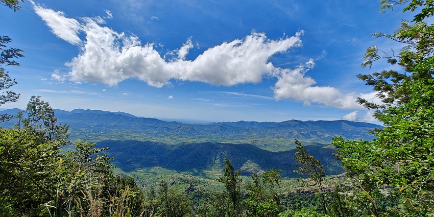 A spectacular view of Megamalai viewpoint of hills and valleys, place for a perfect trip.