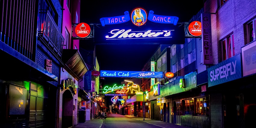 Vibrant neon lights adorning the club, offering a unique nightlife experience