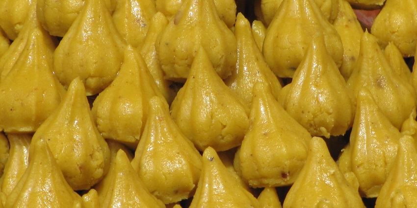A sweet treat and a must-try sweet delicacy made by filling sweet stuffing in the Modak batter
