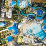 Enjoy adventure rides and water slides at the Mojoland Water Park in Haryana