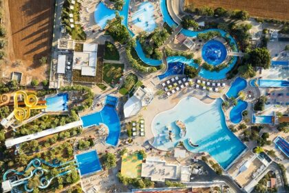 Enjoy adventure rides and water slides at the Mojoland Water Park in Haryana