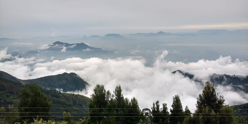 Paragliding in Kodaikanal Moonjikal ground, with a captivating backdrop.