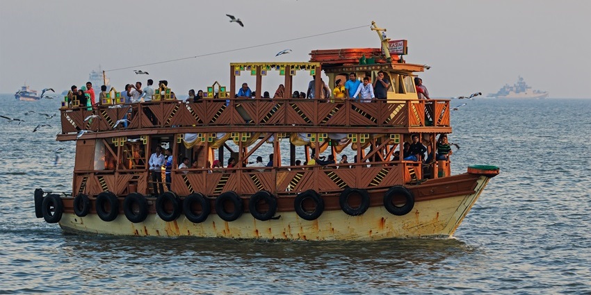 An image of an exciting ferry ride on the Mora Jetty Beach in Navi Mumbai. Maharashtra