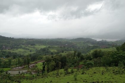 A picture of Matheran hill station with lush greenery, highlighting its natural beauty.