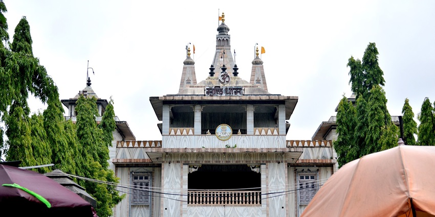 An image of Muktidham Temple: Marble beauty featuring replicas of 12 Jyotirlingas.