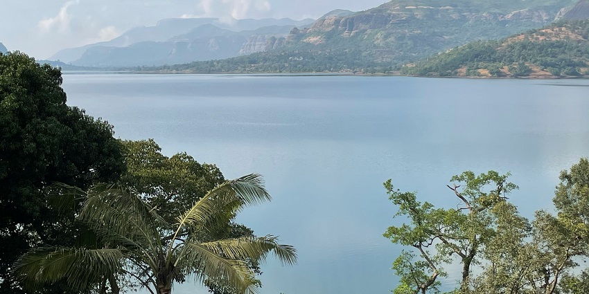 Sunrise over Mulshi Dam, a serene spot near a popular hill station in Maharashtra.