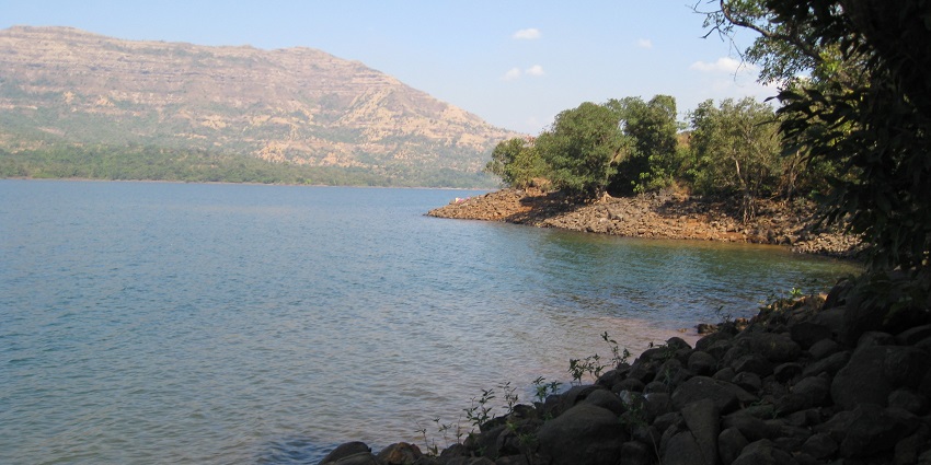 A scenic view of Mulshi Dam, with a vast reservoir, a popular attraction in Mulshi