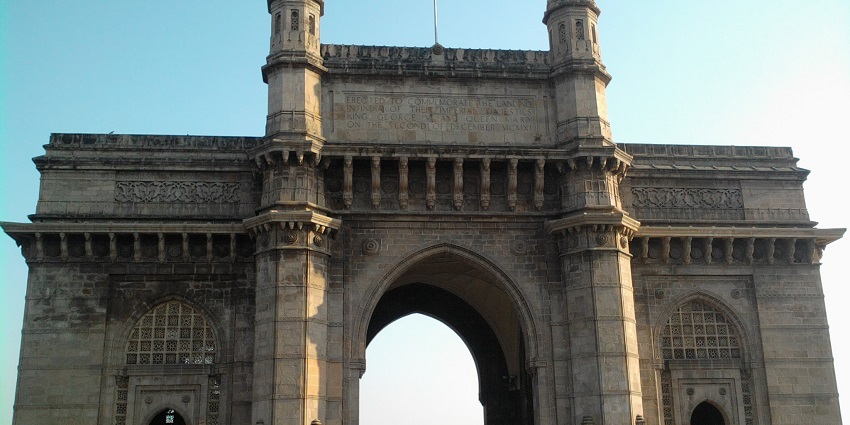 Image of Gateway of India - Mumbai skyline with iconic landmarks under a clear blue sky