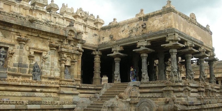 Inside the courtyard of Murugar Temple, showcasing detailed architecture reflecting region's rich heritage.