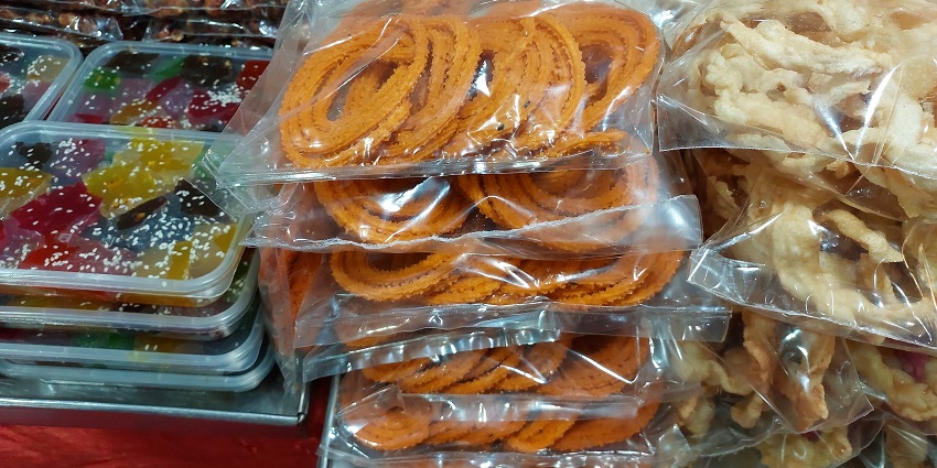 An image of Murukku - a crunchy, spiral-shaped snack made from rice and urad flour.