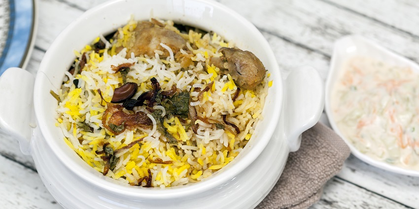 The famous food in Tamil Nadu is fragrant rice dish layered with tender spiced mutton pieces.
