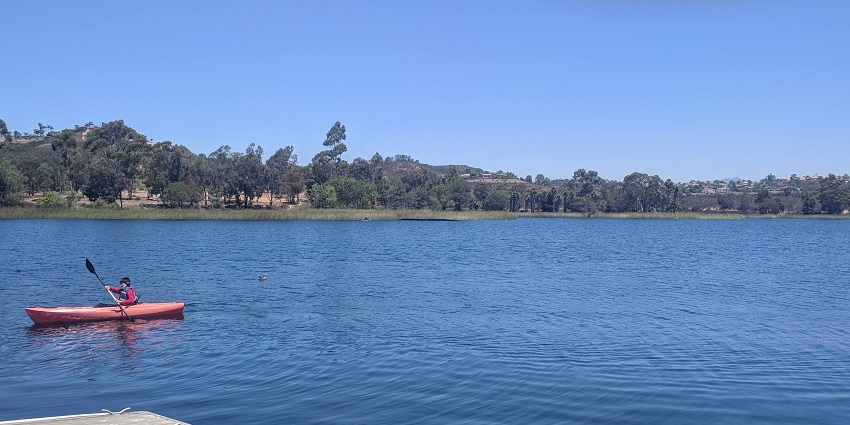 Image of a boy with Kayak - Take a thrilling rides in a speed boats at Muttukadu Lake
