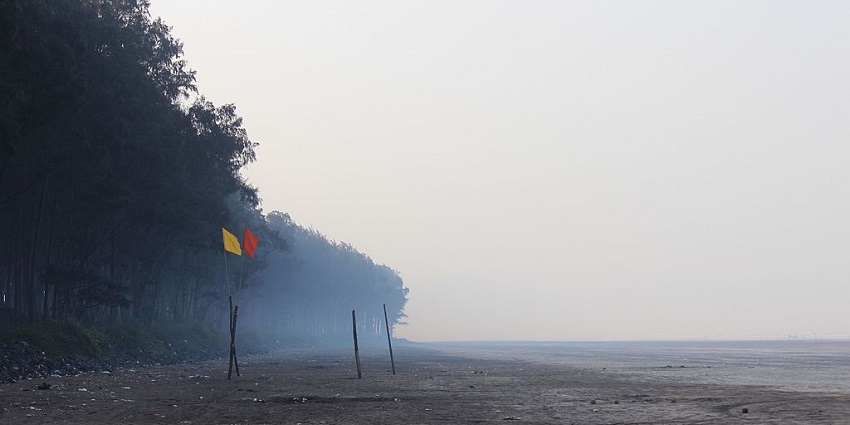 Enjoy the peaceful morning view of Nagaon Beach, a tourist attraction near Kolaba Fort!