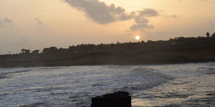 A scenic beach with crystal-clear waters, ideal for scuba diving in Diu.