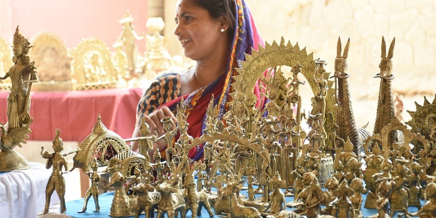 Traditional puja items and local crafts on sale at the Nagoba Mandir Market in Alibaug