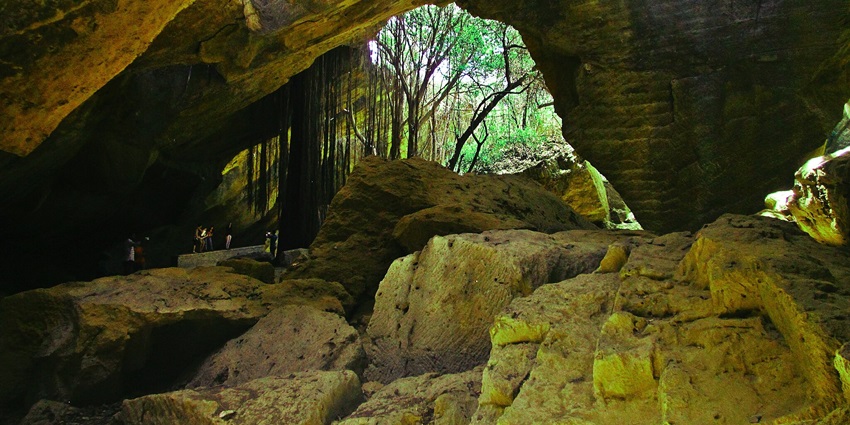 Explore unique rock formations and caves to visit near Diu.