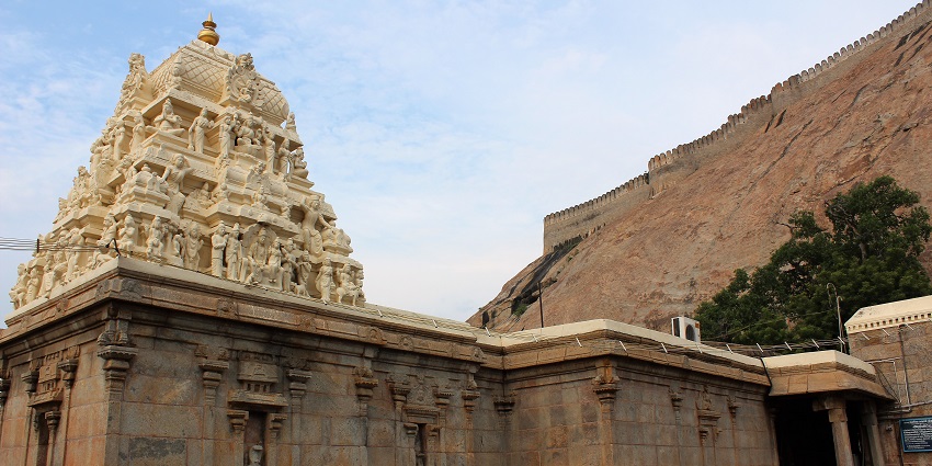An image of the majestic Namakkal Narasimha Temple with intricate sculptures and lush greenery.