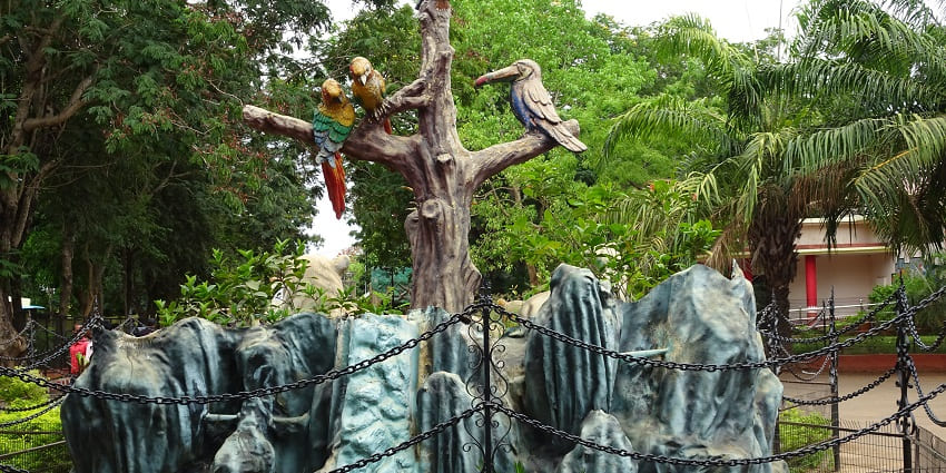 A fountain at the entrance of Nandankanan Zoological Park with four carved birds on it