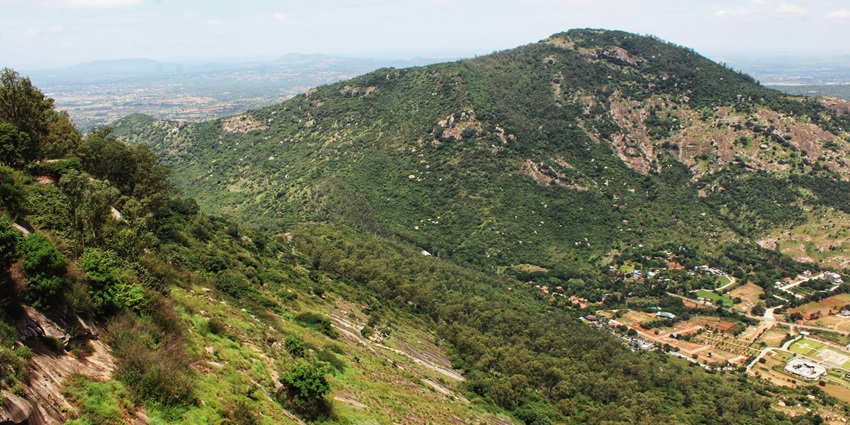 Nandi Hills feature misty landscape offering stunning views near Bangalore for all.