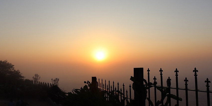 Nandi Hills feature breathtaking sunrise views, trekking trails, and lush greenery.