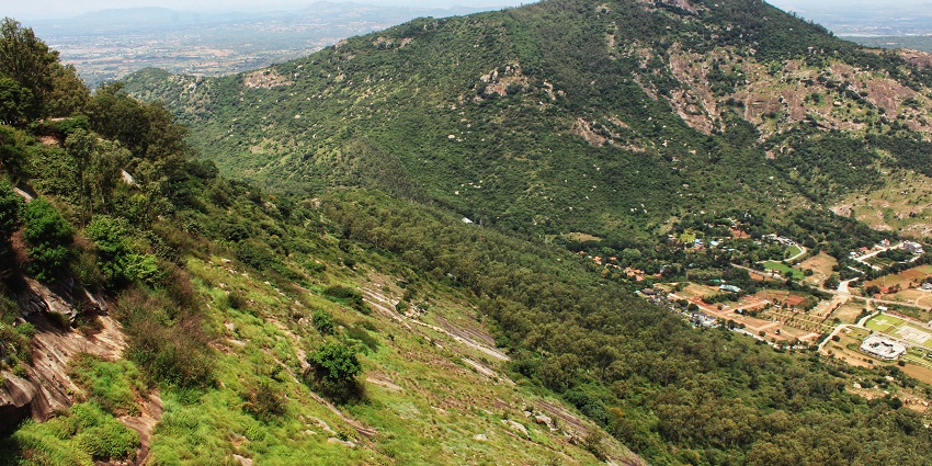 A serene view of Nandi Hills offering picturesque views and decked with majestic peaks.