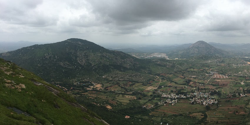 A panoramic view from Nandi Hills, a stunning place to visit near Bangalore in August.