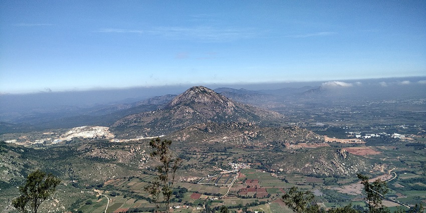There are many places to visit in Chikkaballapur including Nandi Hills with stunning sunrise views, hiking, and ancient temples.