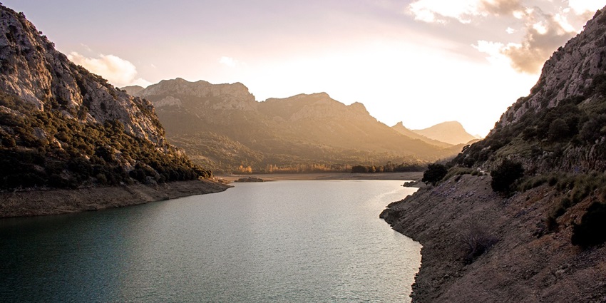 Calm Lake at sunset is one of the best places near Satara Fort, with mountain views.