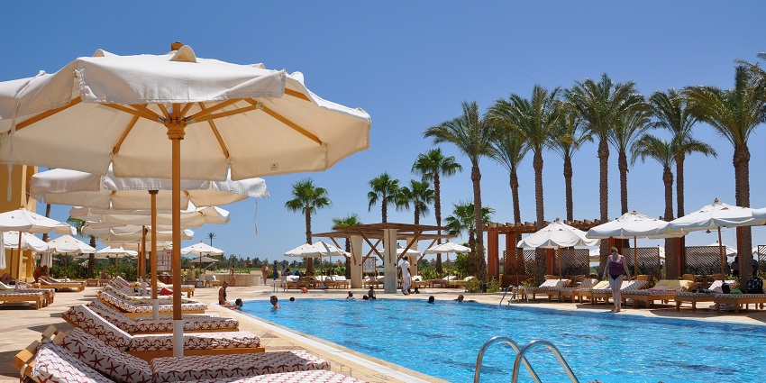 Luxurious boutique hotel blending modern comforts with royal heritage.