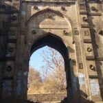 Narnala Fort, surrounded by greenery under a clear sky, showcasing ancient architecture