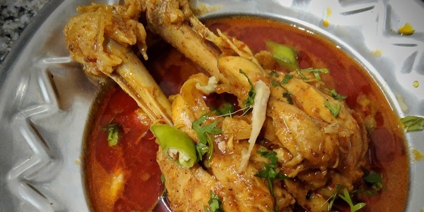 An image of the Nattu Kozhi Kuzhambu, also known as country chicken in Coimbatore