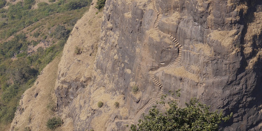 Steep rock-cut steps of the Kalavantin Durg trek, a difficult trek in Maharashtra.