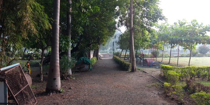 A picturesque Nehru Garden scene showcasing lush flora and inviting relaxation spaces.