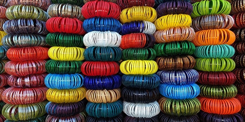 An image of colourful bangles shown in the street while shopping in Tirupati.