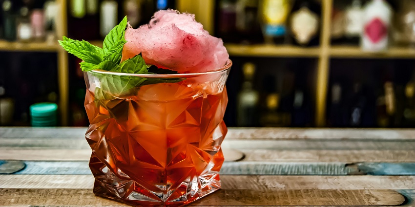 Image of a red drink and ice and mint on the top in Nimo Club - enjoy nightlife in Amritsar