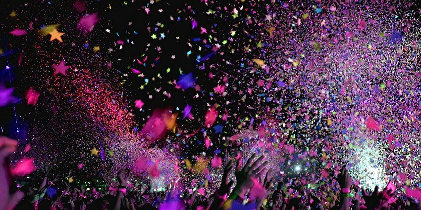 An electrifying atmosphere with people charged with energy for a good time.
