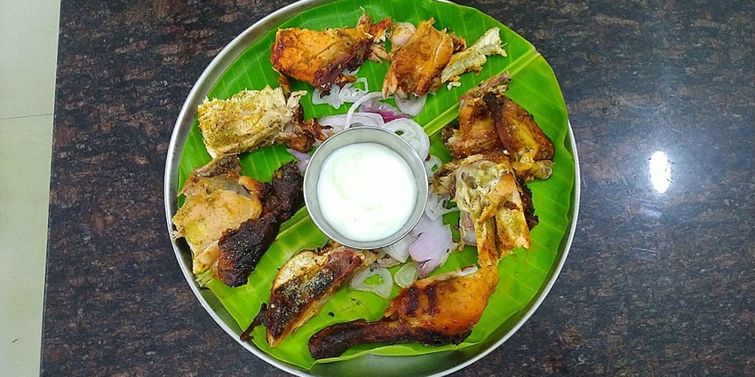 The best food in Madurai is a non-vegetarian meal featuring local flavors at Amma Mess