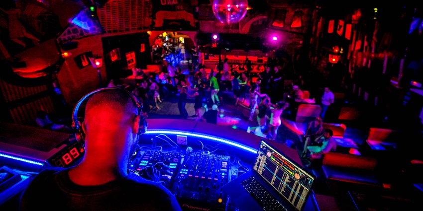 Vibrant neon lights in the club setting the atmosphere for a party
