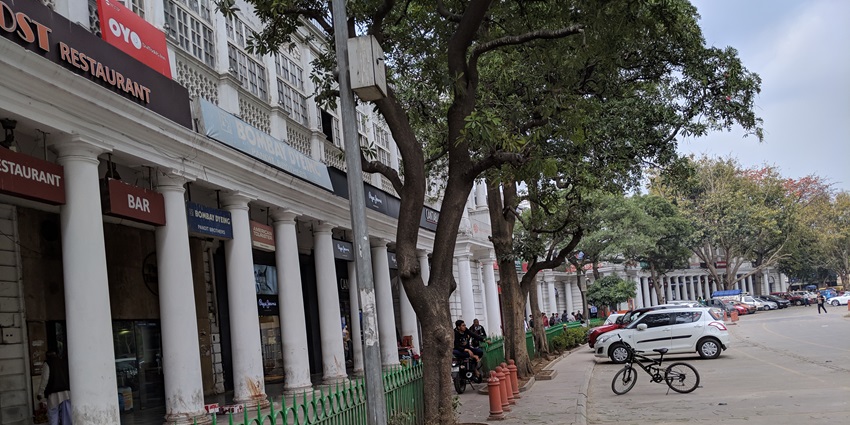 A picture of the Omaxe World Street in Faridabad with various cafes lined up across the pathway