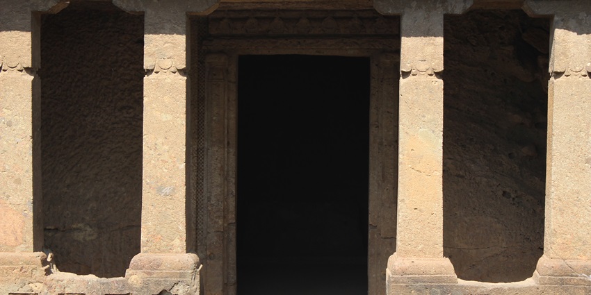 Entrance of Mahakali Caves highlighting ancient rock-cut architecture in Mumbai.
