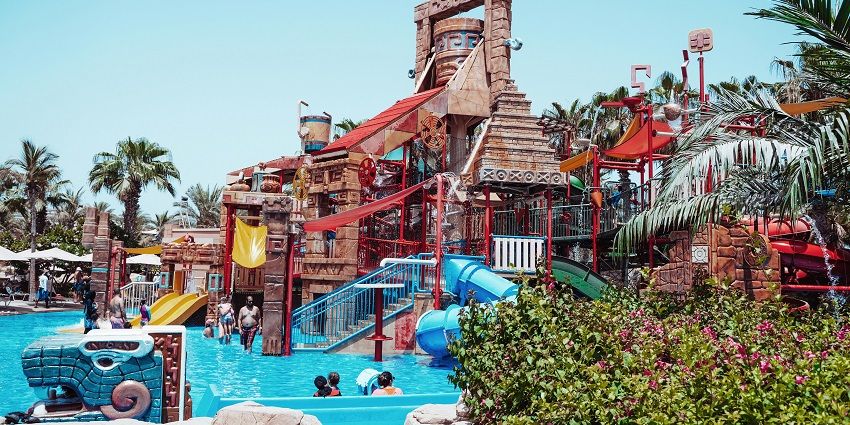 Wide angle view of the various slides and rides inside the water park