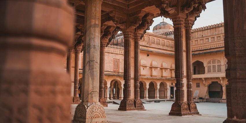 View of the intricate pillars from inside the courtyard of the fort