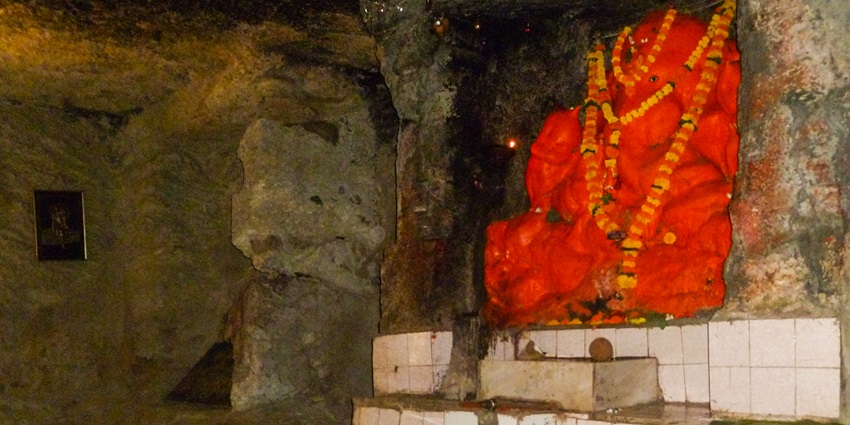 Intricate carvings inside the Jogeshwari Caves, highlighting their artistic heritage