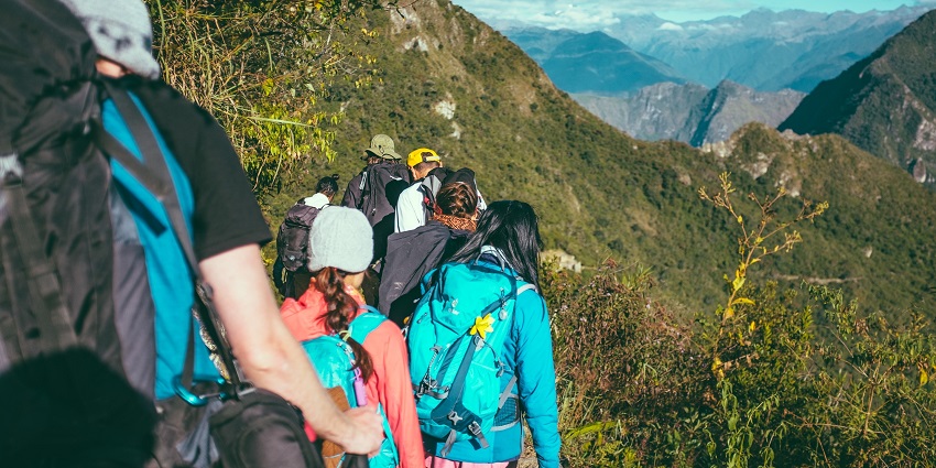 Image of travelers hiking to the fort - ensure you follow the protocols when visiting the fort