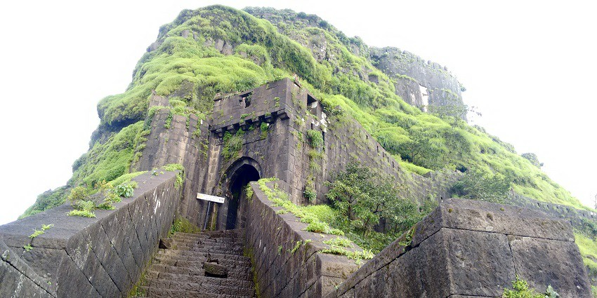 View of Mahur Fort showcasing ancient architecture amidst rocky terrain
